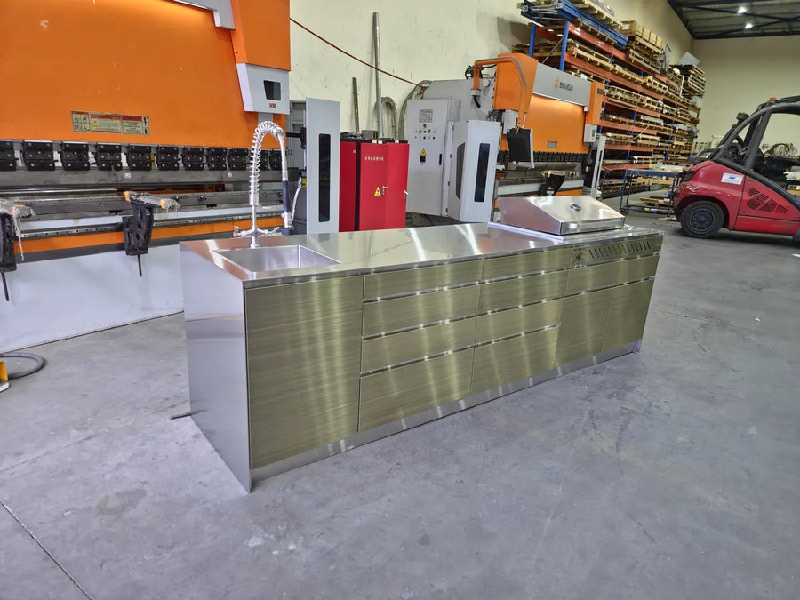 Antique brushed brass outdoor kitchen finished in the Atomic PVD workshop